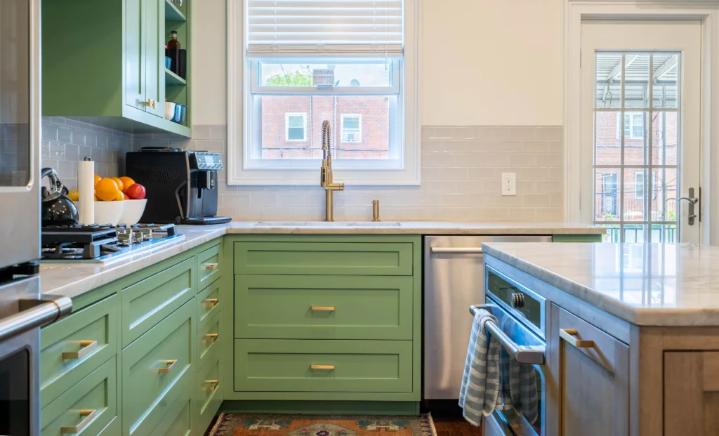 sage green cabinets with white background