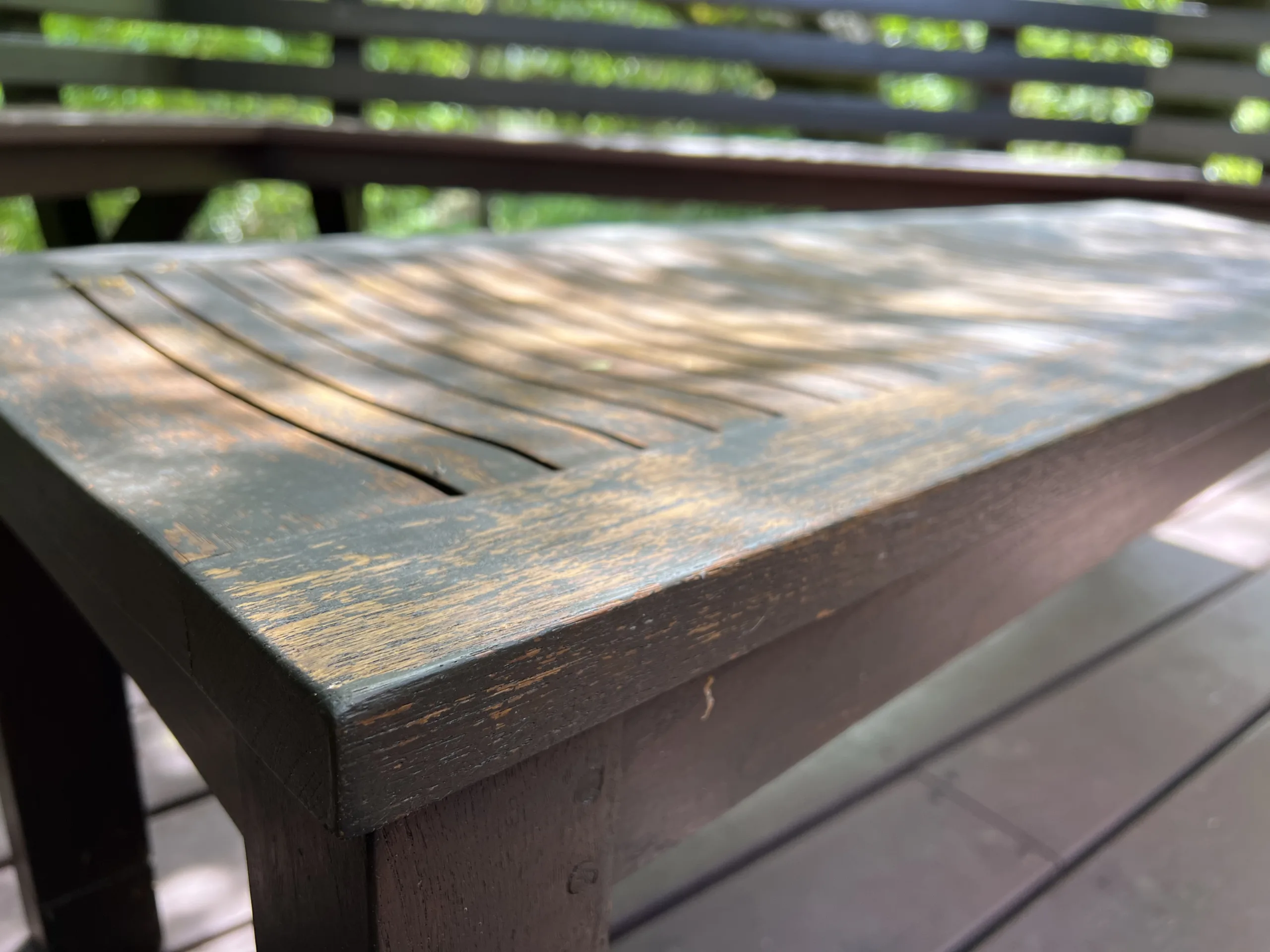 Chipping old bench that needs a refinish with stain