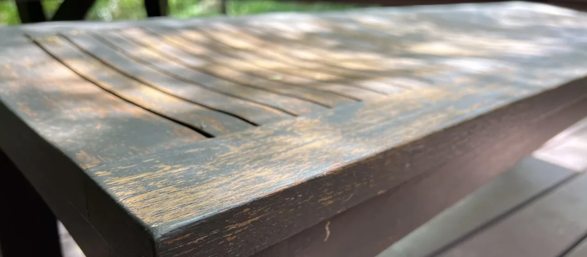 Chipping old bench that needs a refinish with stain